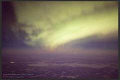 Aurora and a meteorite crater, CanadaHere is an image shot over the Reindeer Lake and Deep Bay Meteorite Crater on 31 December 2018. The image was shot flying 33,000 feet over Saskatchewan Manitoba border.Deep Bay, located at the south end of Reindeer lake and measuring about 13 km wide and 220 m deep, is the site of a large meteorite impact dating about 140 million years ago. According to local legend, it is also the location of a monster which pulls animals through the ice in winter.