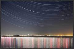 San Francisco Skyline at night
102 minutes of startrails towards the north. The location of imaging is near the SFO airport, and none of the 1000 photos is without an aeroplane, in fact some of the images have a dozen planes recorded. Many images have two planes taking off or landing simultaneously. All the planes have been removed from the individual frames to show the skyline of San Francisco clearly.